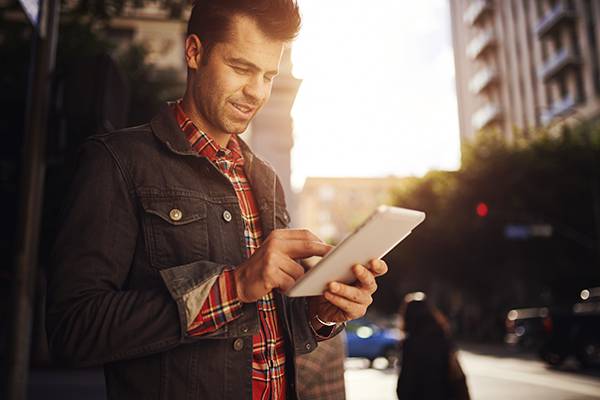 Young Man Searching Online for Products or Services